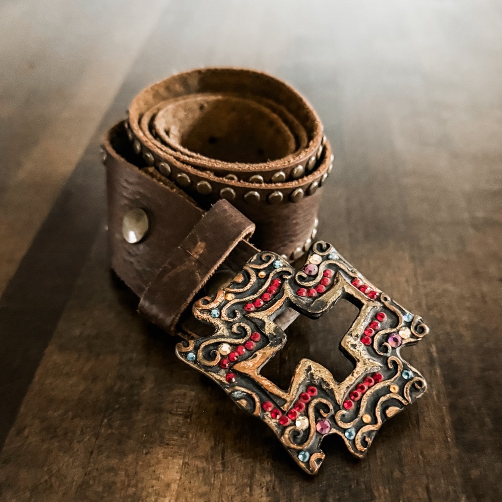 Soft brown studded leather belt.